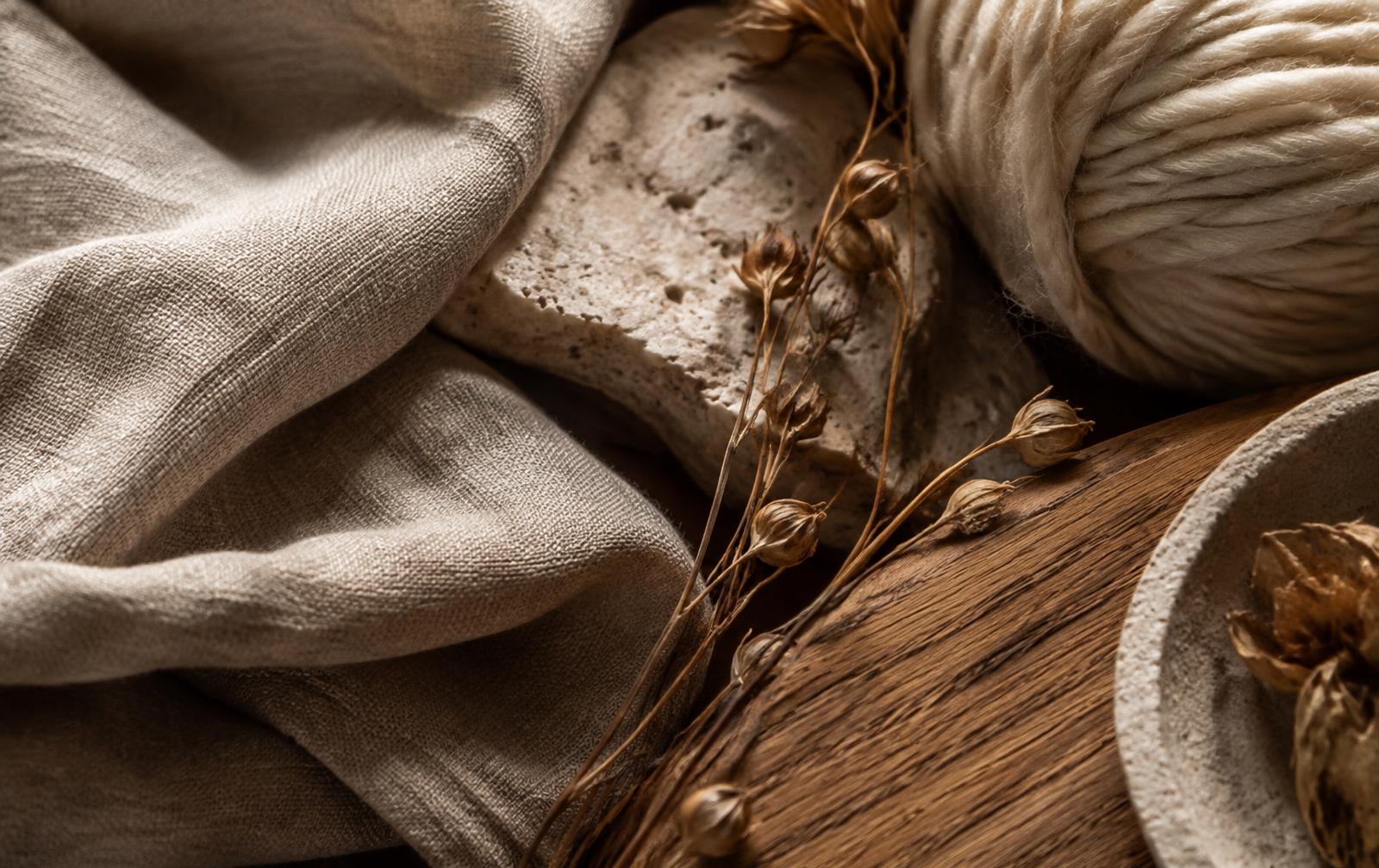 Linen, oak, stone, wool and dried botanicals